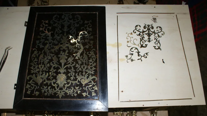 Cartel en marqueterie Boulle et travail de restauration